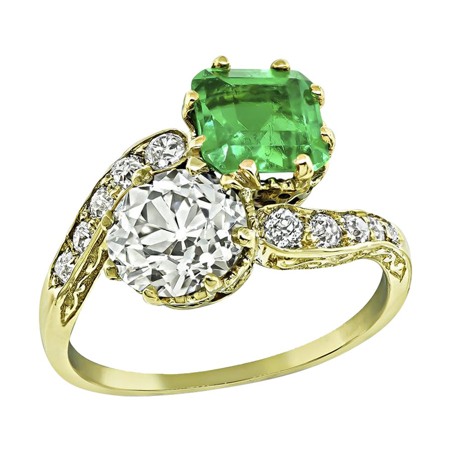 Vintage GIA Certified 1.33ct Diamond 1.50ct Colombian Emerald Crossover Ring For Sale