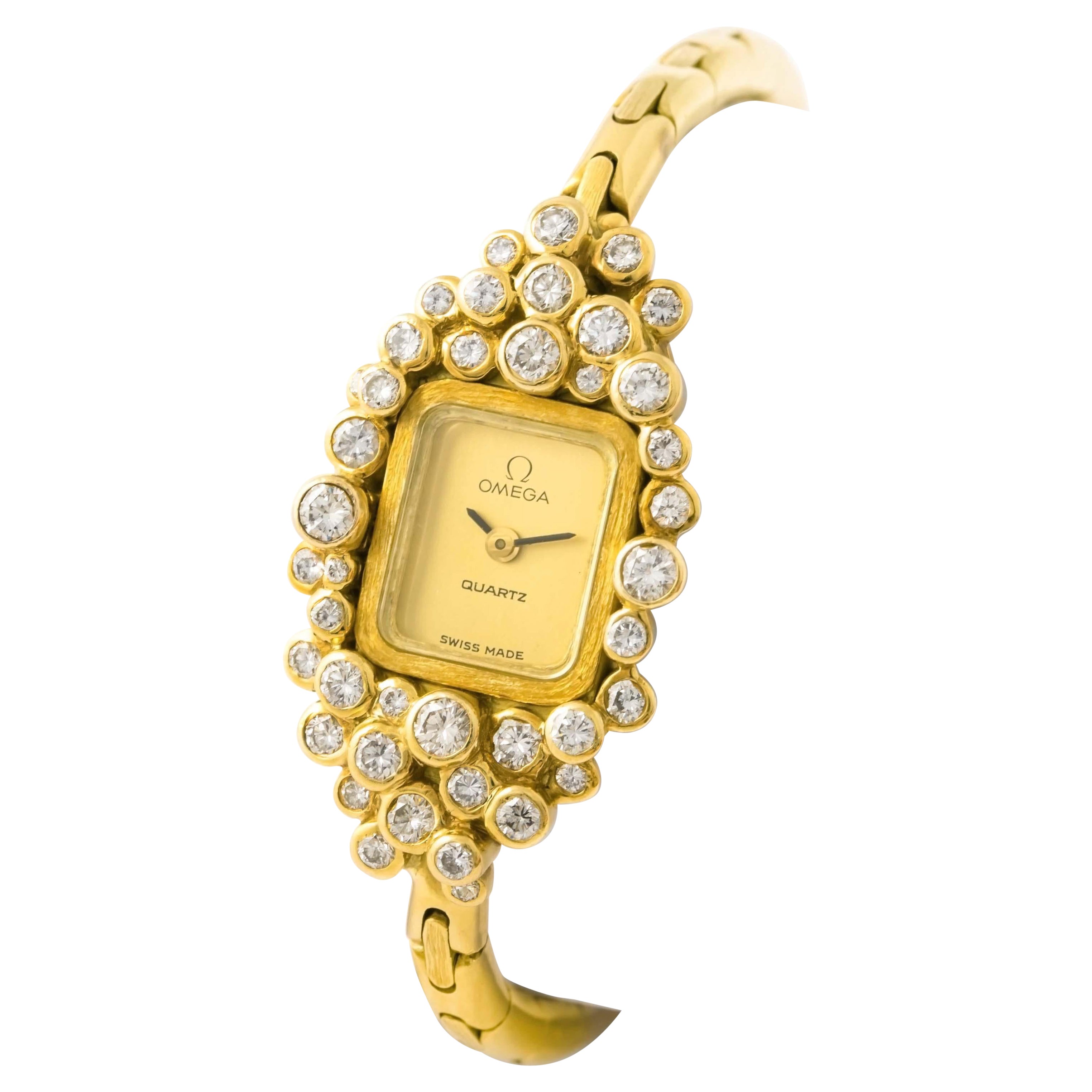 Omega Montre-bracelet unique en or jaune 18 carats avec diamants, années 1970