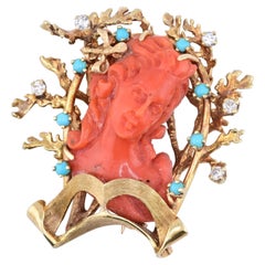 Exceptional 14K Yellow Gold Brooch with Coral Lady Figure Surrounded by Diamonds