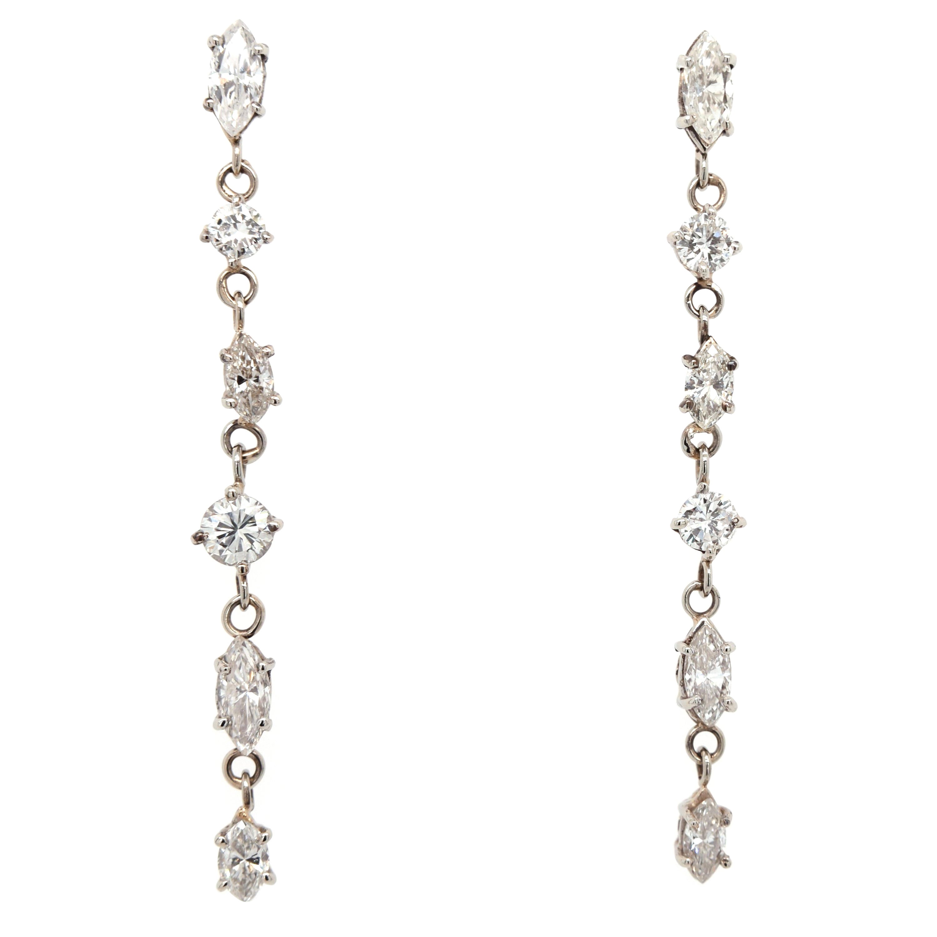 1.56ct mismatched drop diamond earrings, round and marquise brilliant cuts 