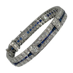 Retro Charming Art Deco Three Row Diamond and Sapphire Bracelet in Platinum