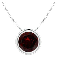 Pendentif solitaire rond en platine serti d'un grenat naturel de 1,5 carat