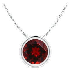 Pendentif solitaire rond en platine serti d'un grenat naturel de 1,5 carat