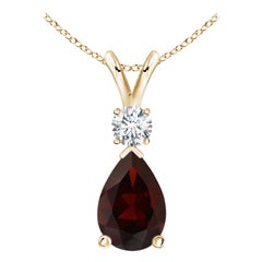 Colgante de lágrima de granate natural de 2,1 ct con diamante en oro amarillo de 14 quilates