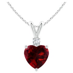 Ciondolo con granato naturale a forma di cuore da 0,90 carati e diamante in platino