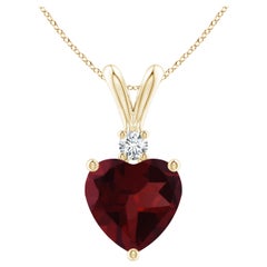 Colgante de granate natural en forma de corazón de 1,85 ct con diamante en oro amarillo de 14 ct