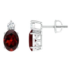 Natural Oval 1.8ct Garnet Stud Earrings with Diamond in Platinum (Size-7x5mm)