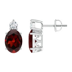 Orecchini con granato ovale naturale da 2,9 carati e diamante in platino