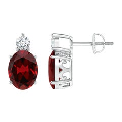 Orecchini con granato ovale naturale da 2,9 carati e diamante in platino