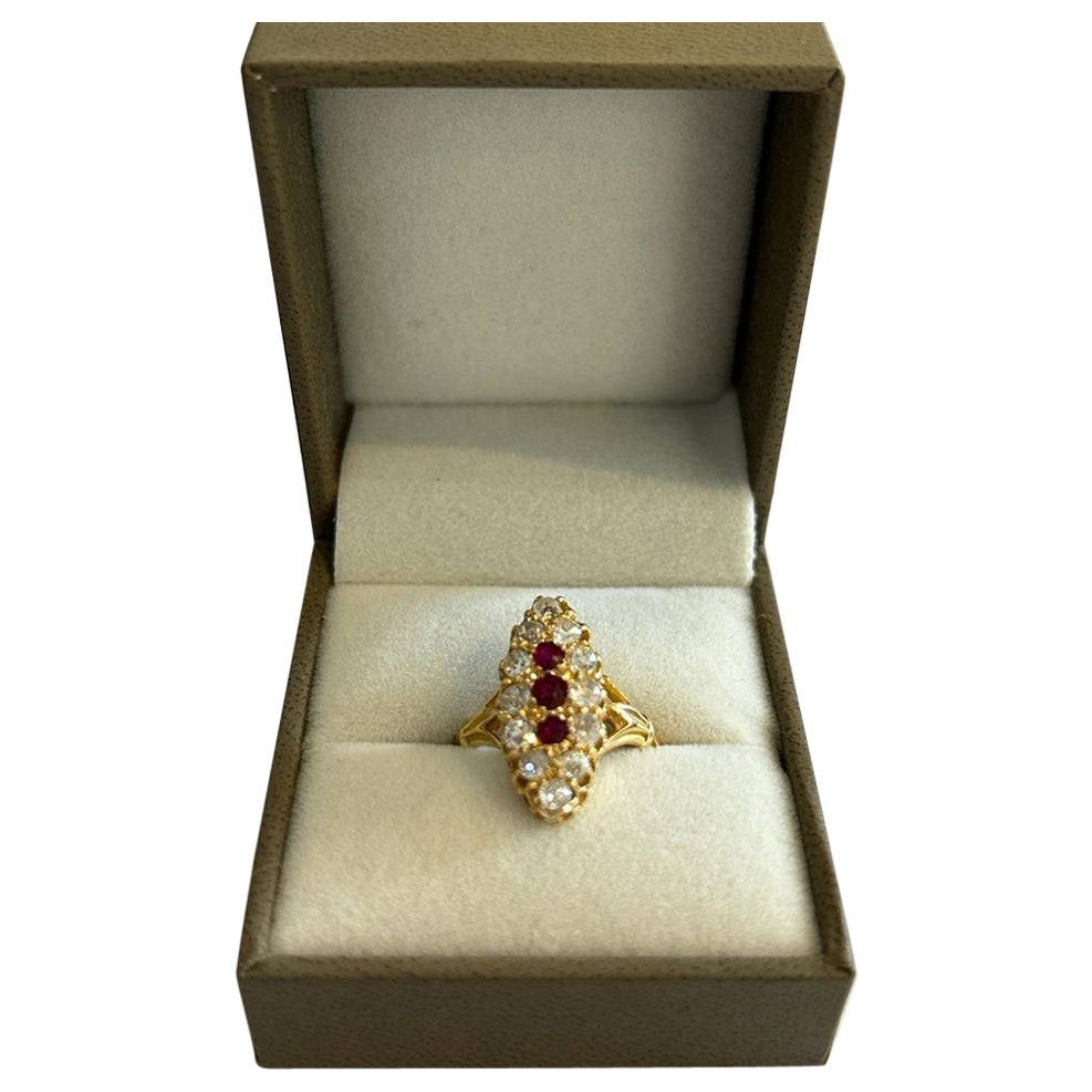 This pretty antique ruby and victorian cut diamond ring is set in 18K yellow gold. Est 0.90ct, H/SI2 in clarity and comes in US size 6 1/2 / UK Size N.