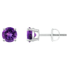 Borchie con ametista tonda da 0,90 ct. in platino con incastonatura a cesto naturale
