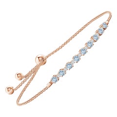 Bracciale tennis con acquamarina naturale e diamanti da 0,90 carati in oro rosa 14 carati