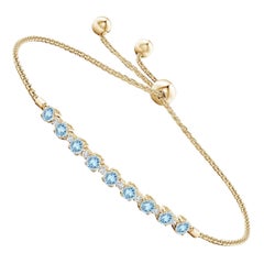 Bracelet tennis en or jaune 14 carats avec aigue-marine naturelle de 0,90 carat et diamants