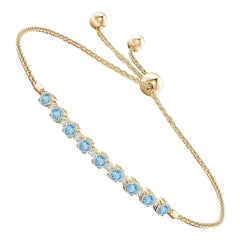 Bracelet tennis en or jaune 14 carats avec aigue-marine naturelle de 0,90 carat et diamants