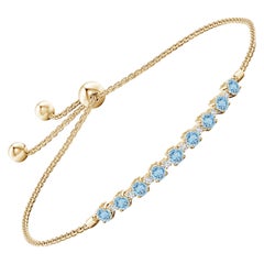 Pulsera de tenis de aguamarina natural de 0,90 ct y diamantes en oro amarillo de 14 quilates