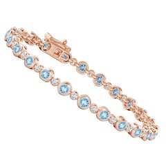 Bracciale tennis con castone, acquamarina e diamanti da 2,40 carati in oro rosa 14K
