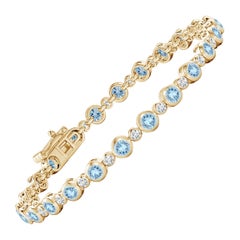 Bracciale tennis con castone, acquamarina e diamanti da 2,40 carati in oro giallo 14 carati