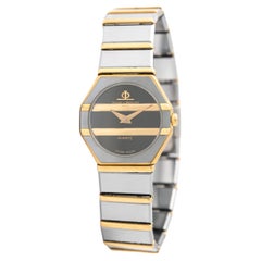 Baume & Mercier, montre-bracelet vintage d'avant-garde en acier inoxydable