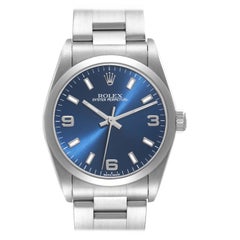 Rolex Oyster Perpetual Midsize 31 avec cadran bleu, montre pour femme 77080 Boîte et papiers d'origine