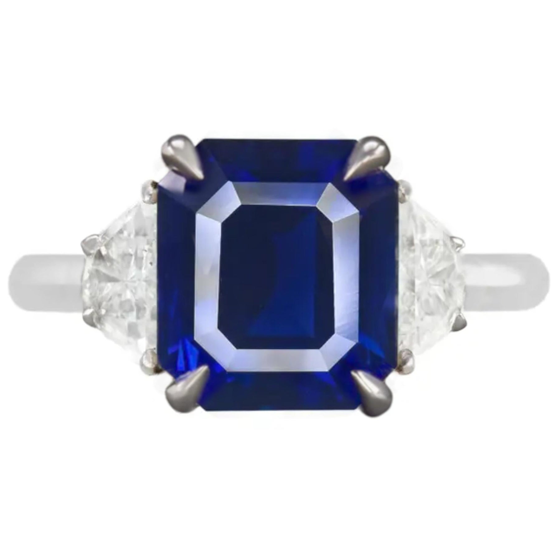 Bague avec saphir bleu de 5 carats certifié GIA et diamant taille émeraude en vente