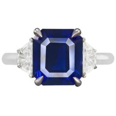 Bague avec saphir bleu de 5 carats certifié GIA et diamant taille émeraude
