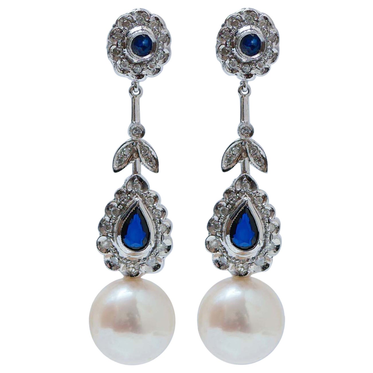 White Pearls, Sapphires, Diamonds, Platinum Dangle Earrings.
