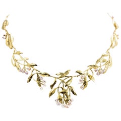 Collana a catena in oro giallo con perle