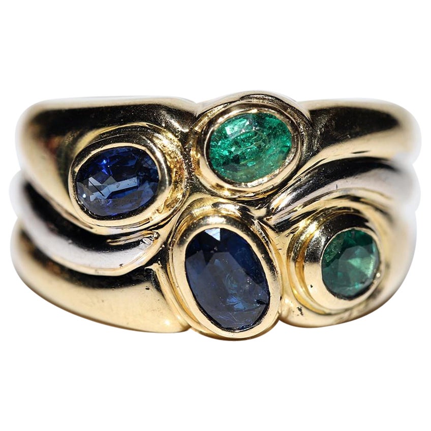Vintage Circa 1980s 18k Gold Natural Emerald And Sapphire Decorated Ring For Sale