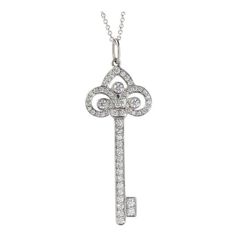 TIFFANY & Co. Platinum Diamond Fleur De Lis Key Pendant Necklace For Sale