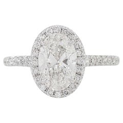 TIPO IIA IF Anillo de oro blanco con diamante ovalado halo de 2 quilates certificado por GIA