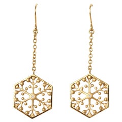 Boucles d'oreilles pendantes Independence flocons de neige en or 18 carats