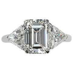 Modern Emerald Cut Diamond and White Gold Three Stone Ring, 3.15 Carats