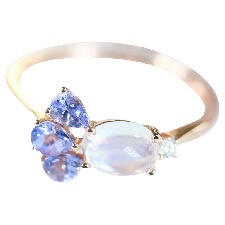 1.10 Carat-Oval Cab moonstone, Tanzanite and Diamond 14K Rose Gold Ring For Sale