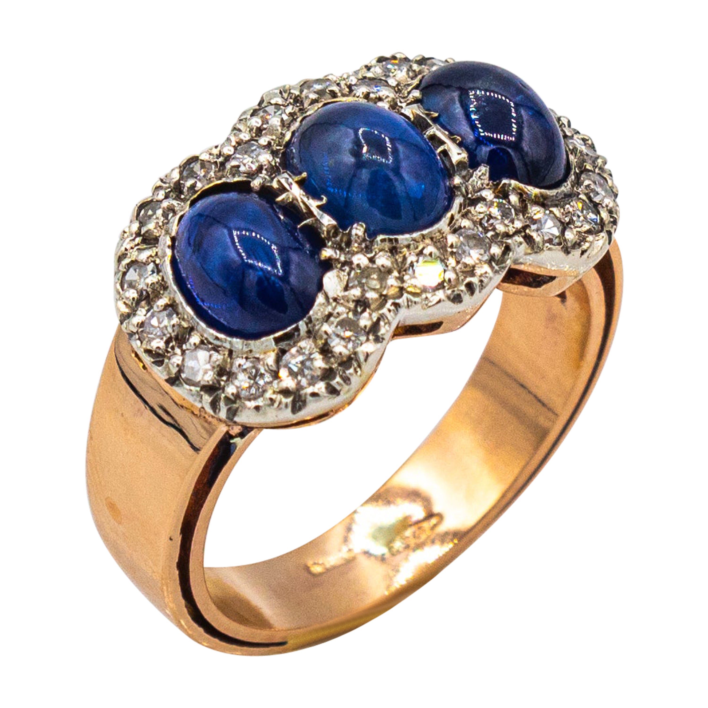 Gelbgoldring im Art-déco-Stil mit weißem Diamanten und blauem Saphir im Cabochon-Schliff im Angebot