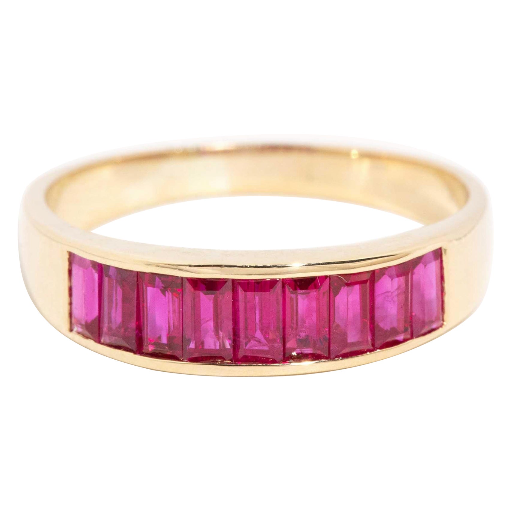 Vintage Circa 1990s 1.00 Carat Baguette Cut Red Ruby Band 18 Carat Yellow Gold For Sale
