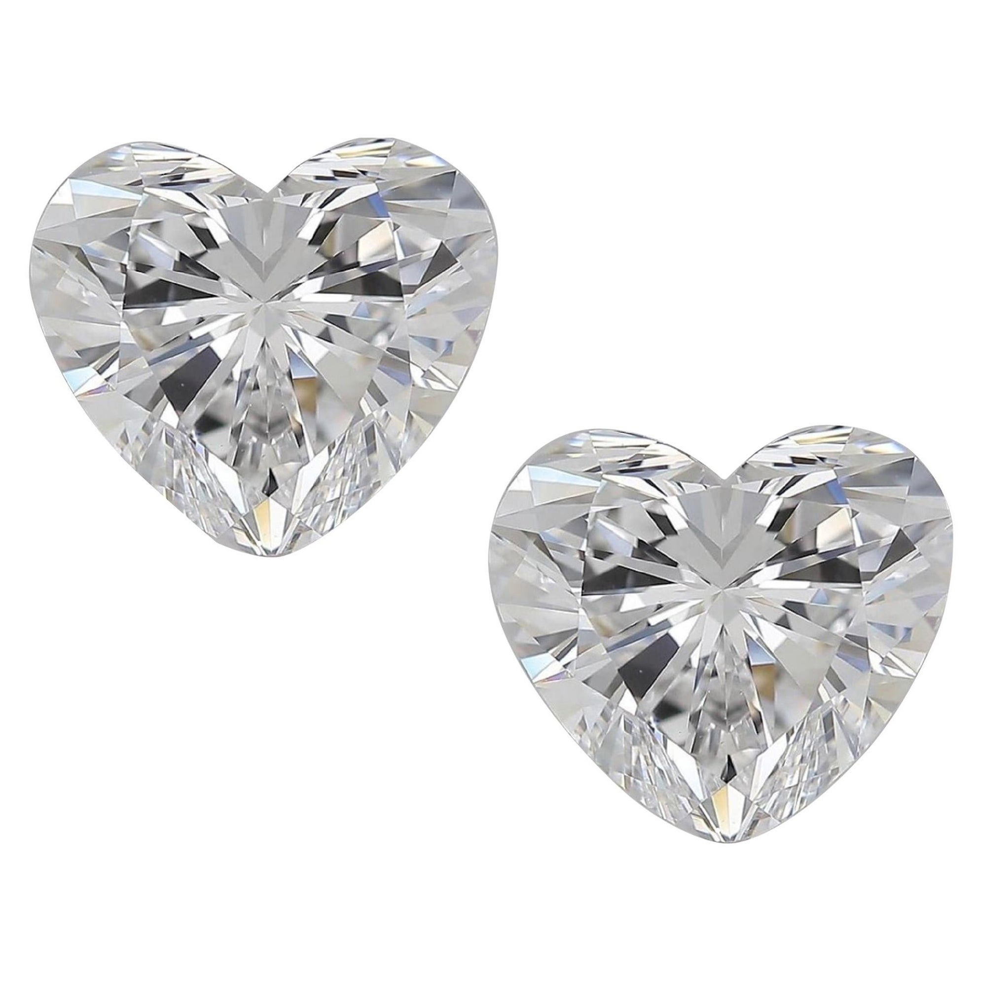 Elevate your elegance with this exquisite pair of heart-cut diamond earrings. Set in lustrous platinum studs, these remarkable gems boast a captivating allure. The diamonds, radiate a brilliance that catches every glimmer of light, ensuring a