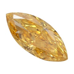 0,69 carat, FANCY VIVID orange-jaune, diamant taillé Clarté I1 certifié GIA