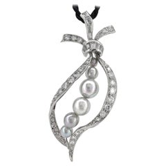 1 Carat Diamond Ribbon Pendant in Platinum with Silver-Blue Akoya Pearls