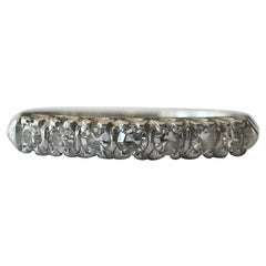 Art-Déco-Ring aus Platin mit sieben Steinen und Diamanten 