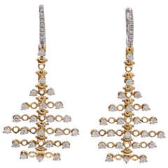 Boucles d'oreilles en or jaune 18 carats et or blanc avec diamants