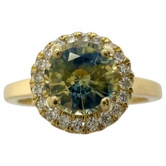 Bague halo en or jaune 18 carats avec saphir bleu jaune bicolore non traité et diamants 1,20 carat