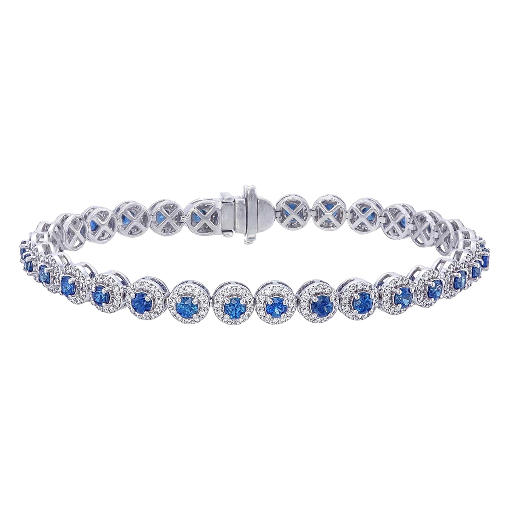 Tennisarmband mit blauem Saphir und einem Halo aus Diamanten rundherum 