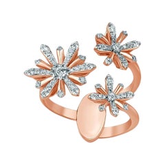 Bague ouverte en or rose 18 carats et diamants avec trois fleurs d'Edelweiss