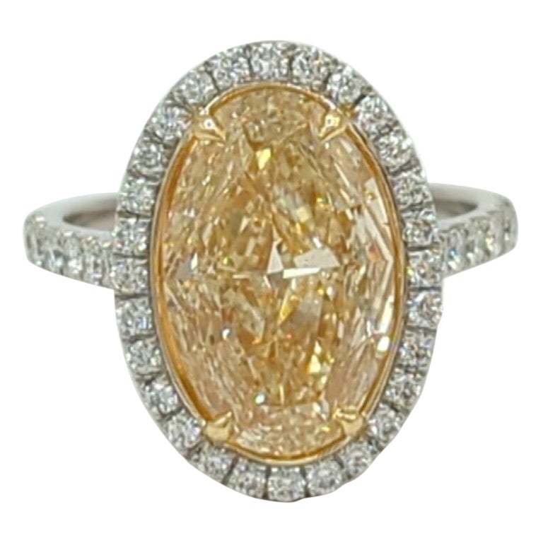 Natural Yellow Diamond Oval and White Diamond Ring in 18K 2 Tone Gold