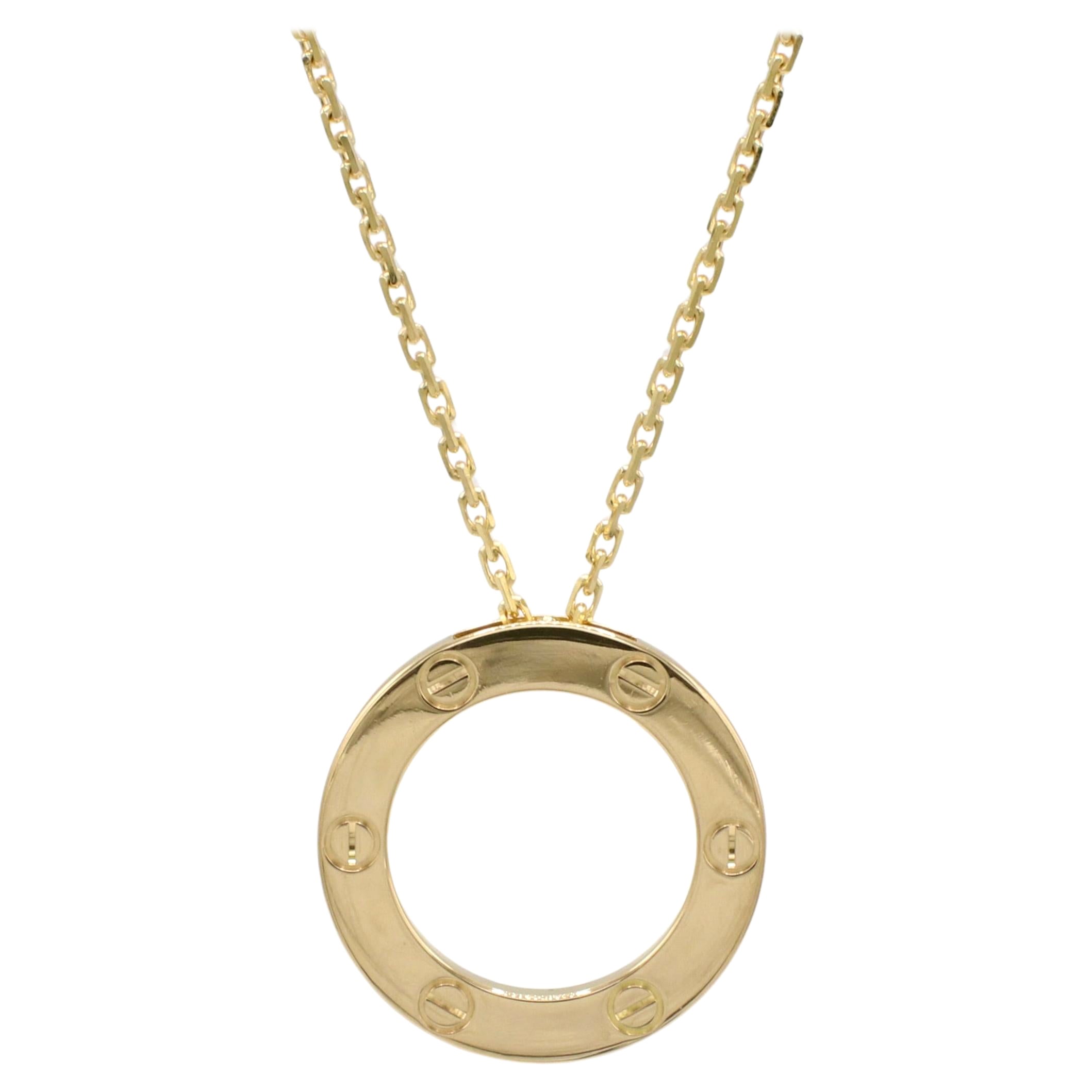 Cartier Love, collier pendentif pendant en or jaune 18 carats, boîte et papiers en vente