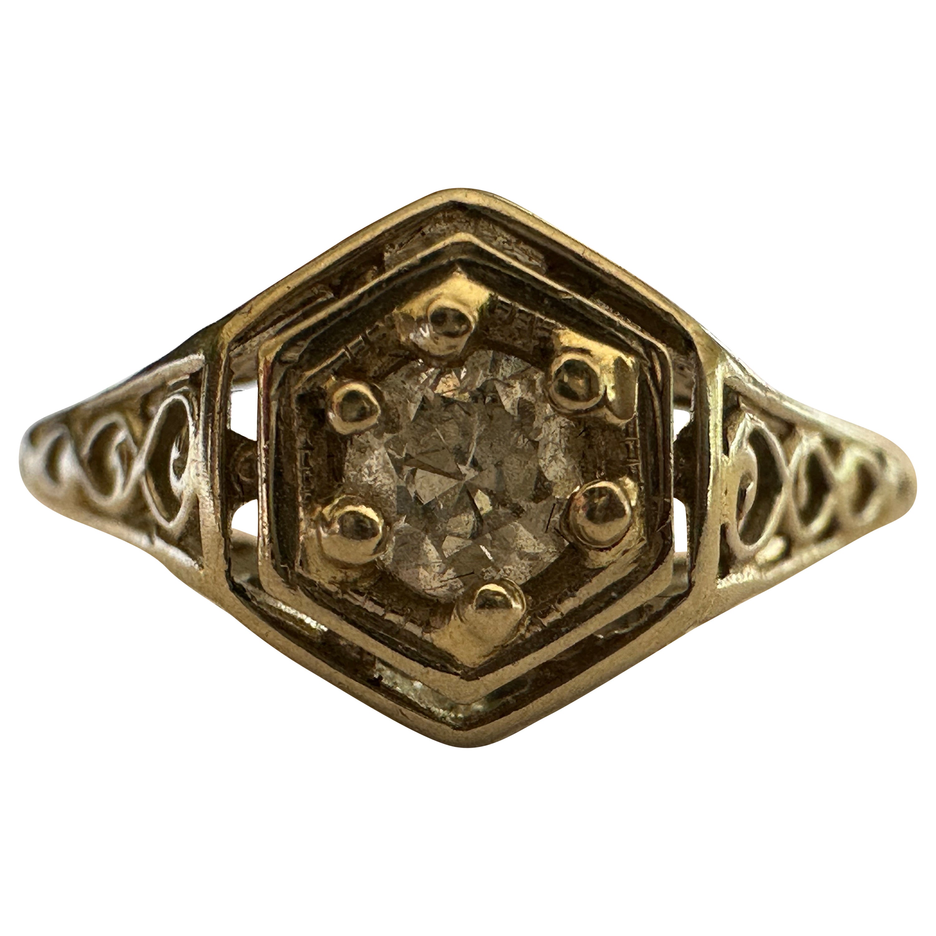 Anillo de compromiso antiguo con diamante solitario y filigrana