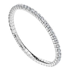  Bracelet stretch en or blanc avec diamants taille émeraude