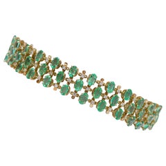 Smaragde, Diamanten, modernes Armband aus 18 Karat Gelbgold.