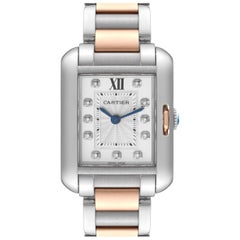 Cartier, petite montre Tank Anglaise en acier avec cadran en or rose et diamants, pour femmes WT100024