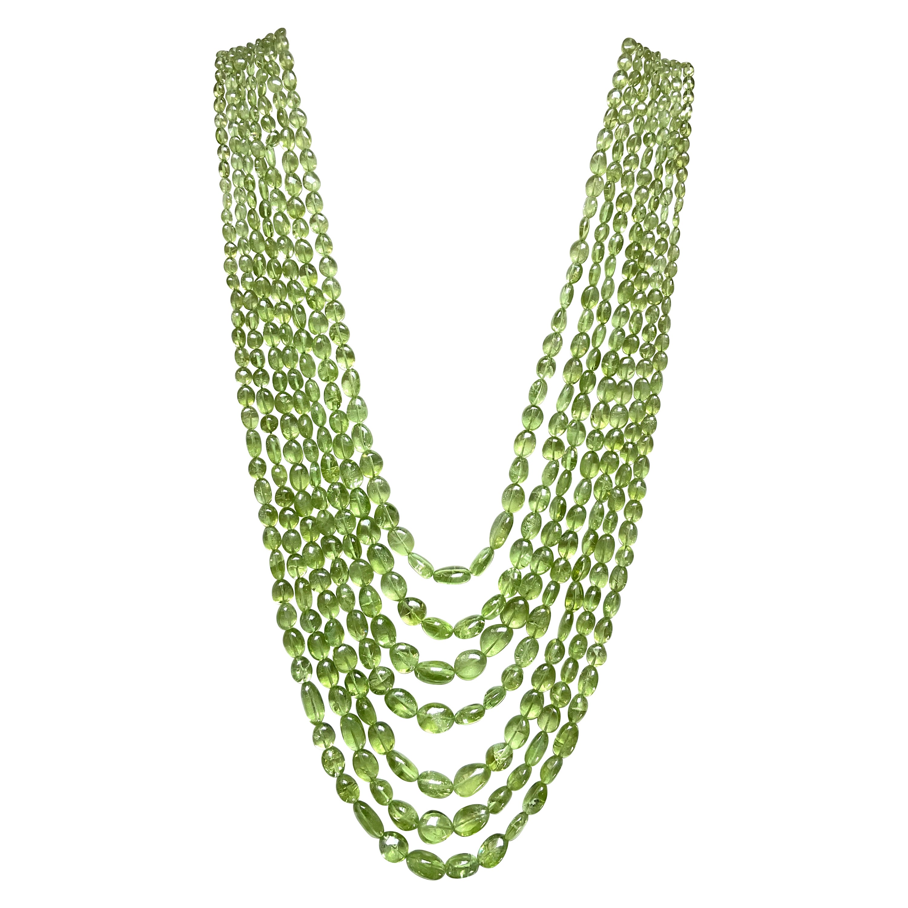1055.55 carat apple green peridot top quality plain tumbled natural necklace gem For Sale
